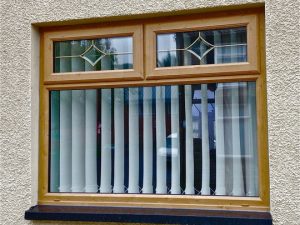 Oak colour double glazed windows with blinds