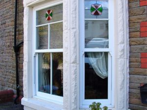 Sliding sash windows with decorative glazing