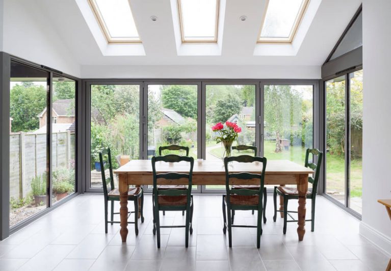 Bi-folding door made using aluminium fitted to a new extension