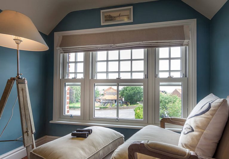 uPVC vertical sliding sash windows fitted into relaxation room