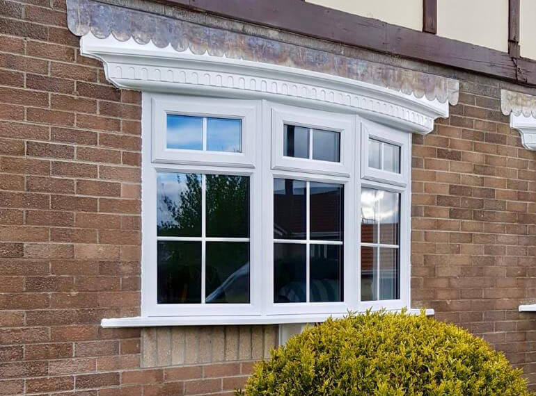 Double glazed upvc bay window with astragal bars