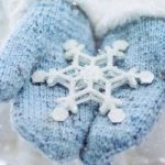 Girl holding a snowflake