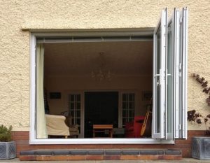 fully open white bifold doors