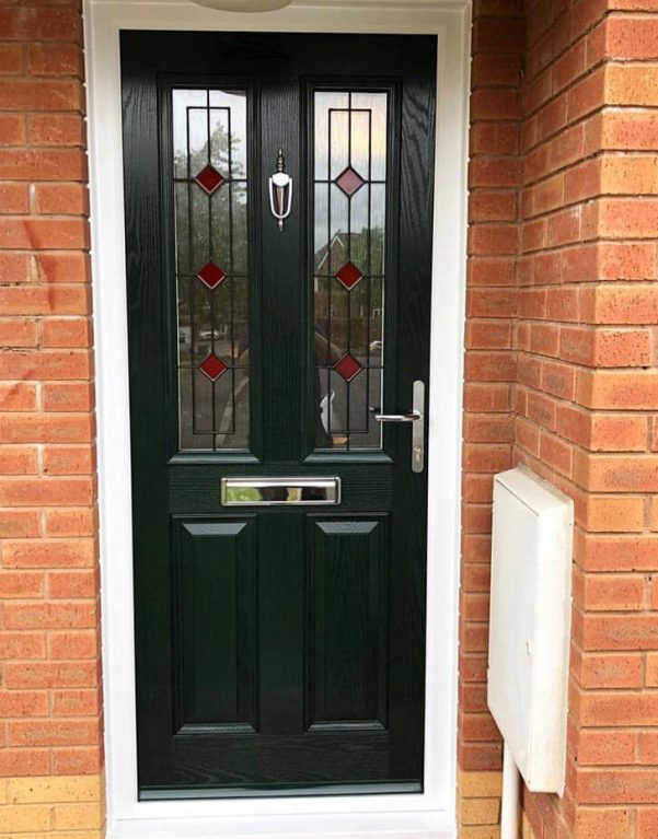Green composite entrance door with decorative glazing