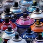 Spray paint cans