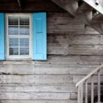 Old window with blue shutters