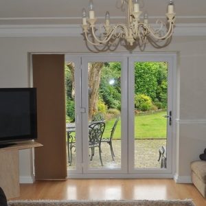 white upvc french triple doors