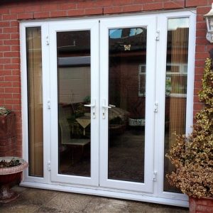 white double glazed french doors with side panels
