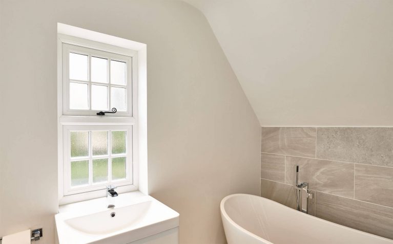 Flush sash windows with double glazed frosted glass for bathroom installation
