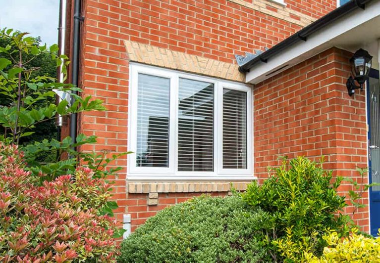 External view of standard double glazed windows with blinds