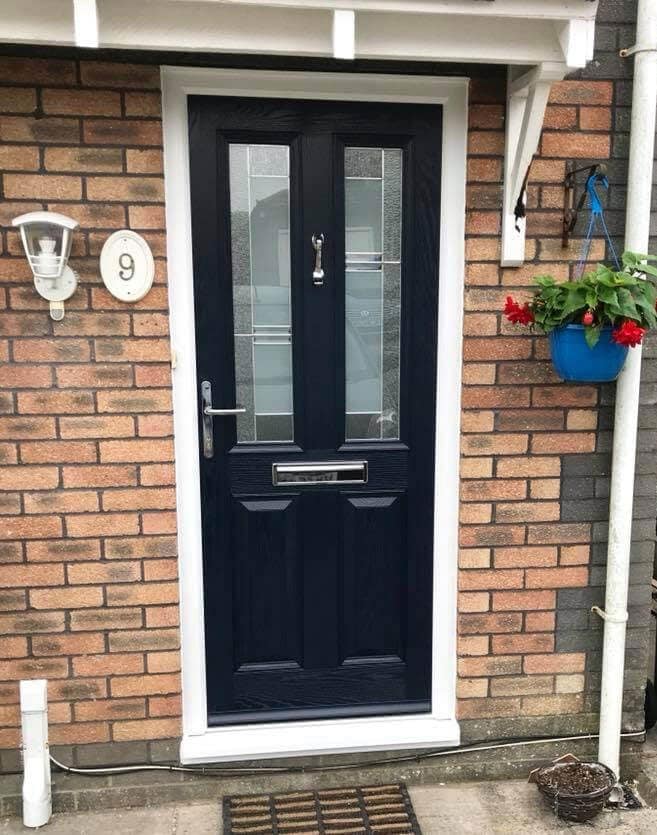 Black front door with modern glazing pattern