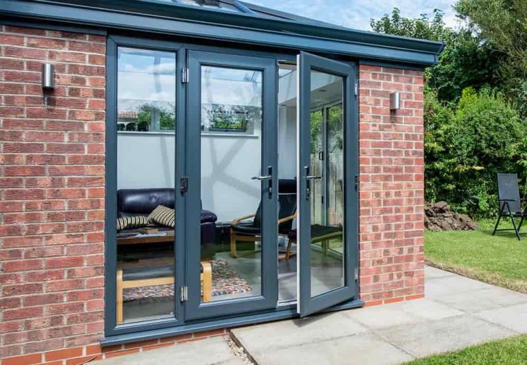 French doors in grey coloured uPVC fitted onto an extension
