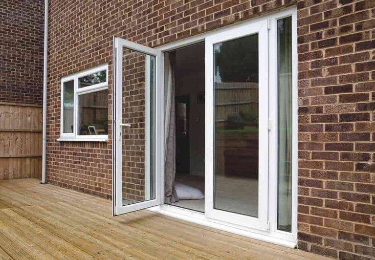 A white uPVC french door with one panel open