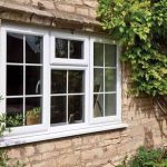 White uPVC casement windows on traditional South Wales home