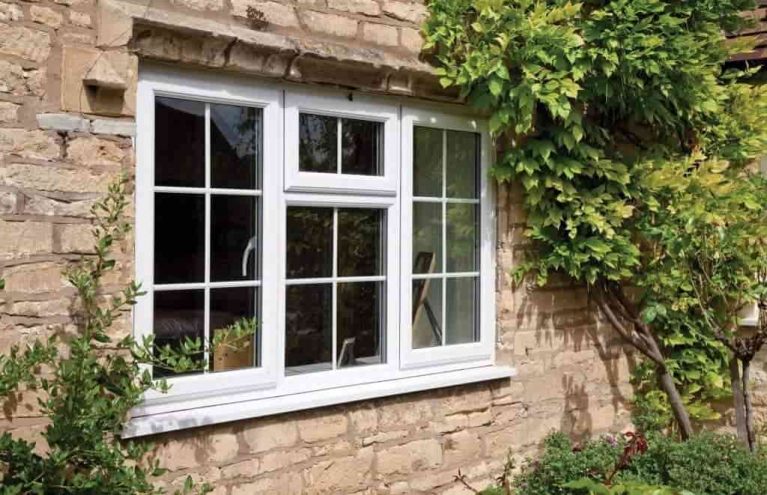 White uPVC casement windows on traditional South Wales home